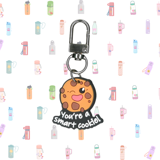 Keychain with cartoon cookie design and text on a white background with water bottle illustrations.